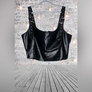 Forever 21 Faux leather crop top with buckle straps and zip backing.